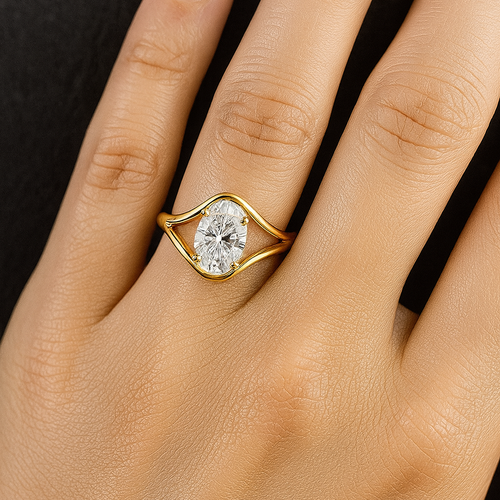 Handcrafted oval diamond engagement ring in gold setting