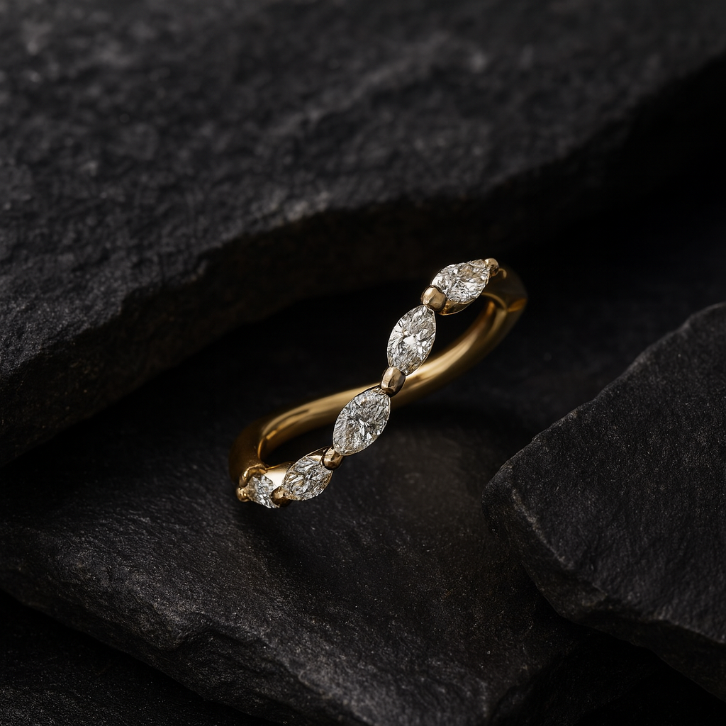 Handcrafted wedding ring in gold with 5 marquise diamonds