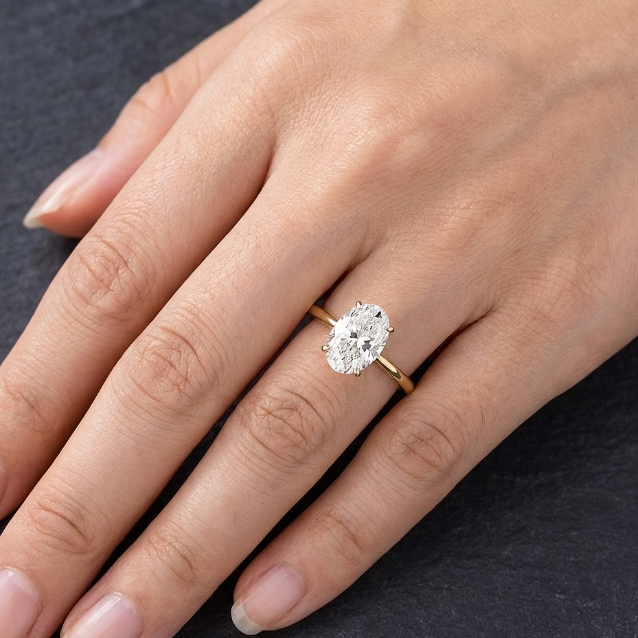 Handcrafted oval 3 Karat diamond engagement ring in 18K gold setting