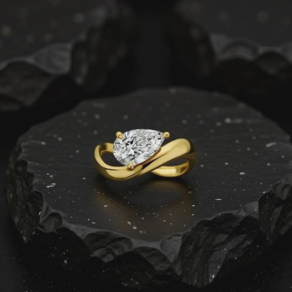 Artisan pear cut 2ct diamond engagement ring in gold setting