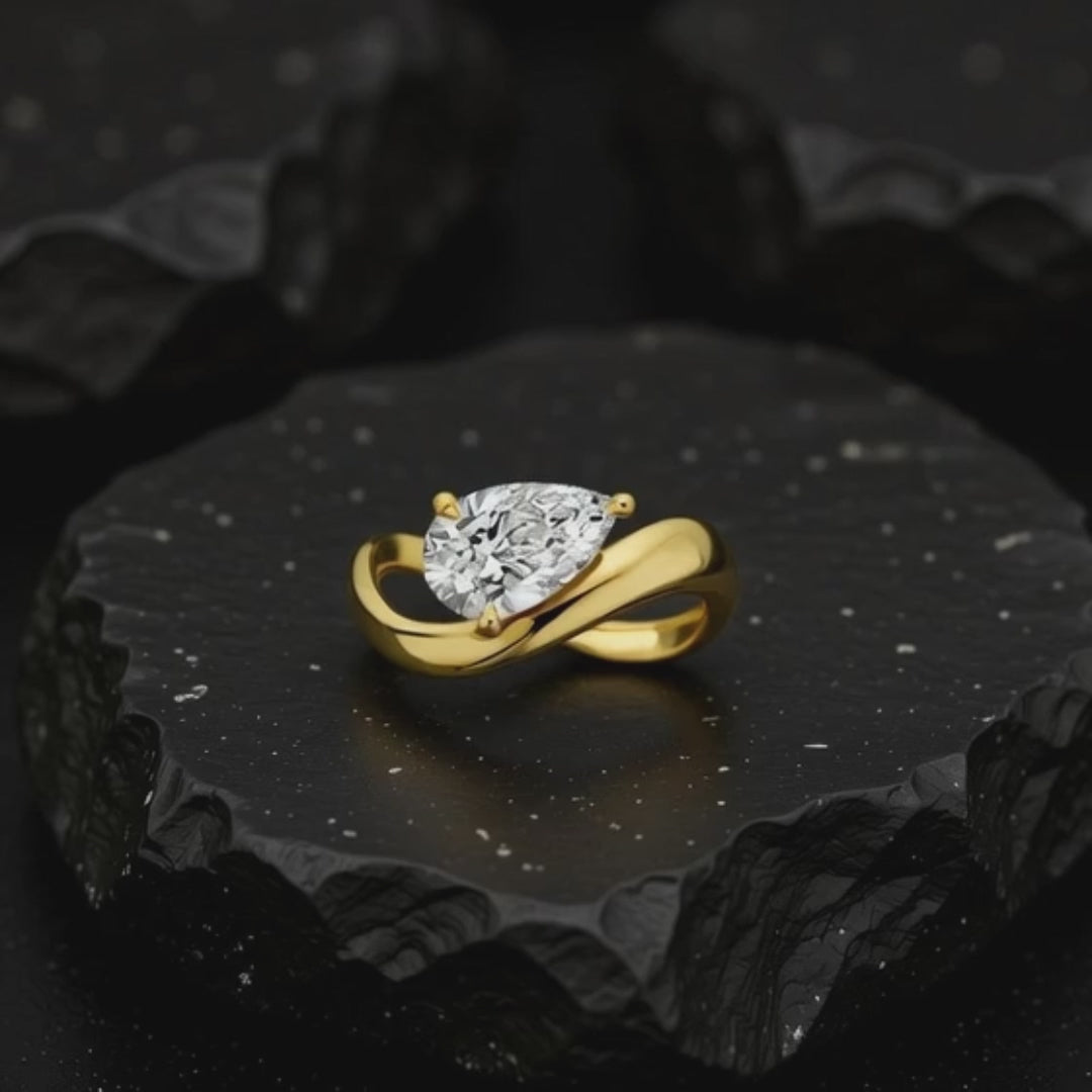 Artisan pear cut 2ct diamond engagement ring in gold setting