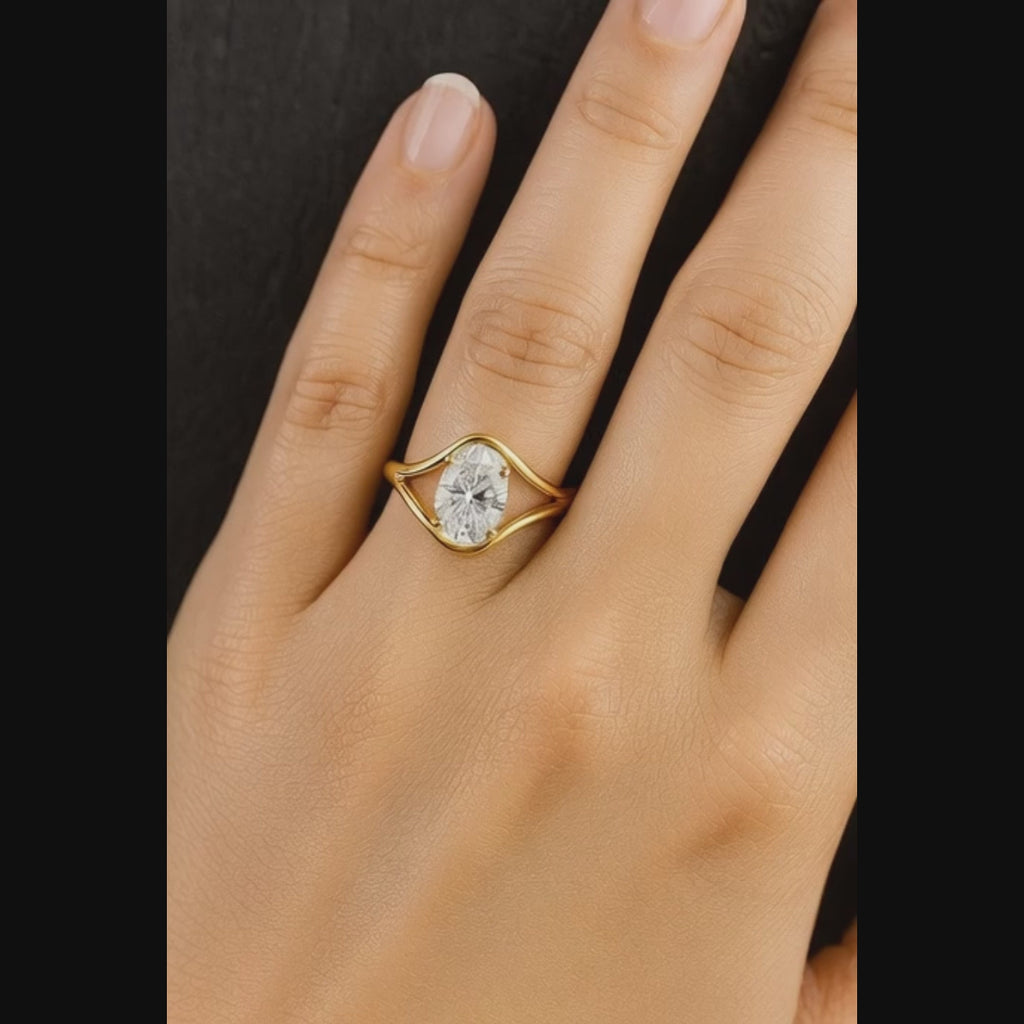 Handcrafted oval diamond engagement ring in gold setting