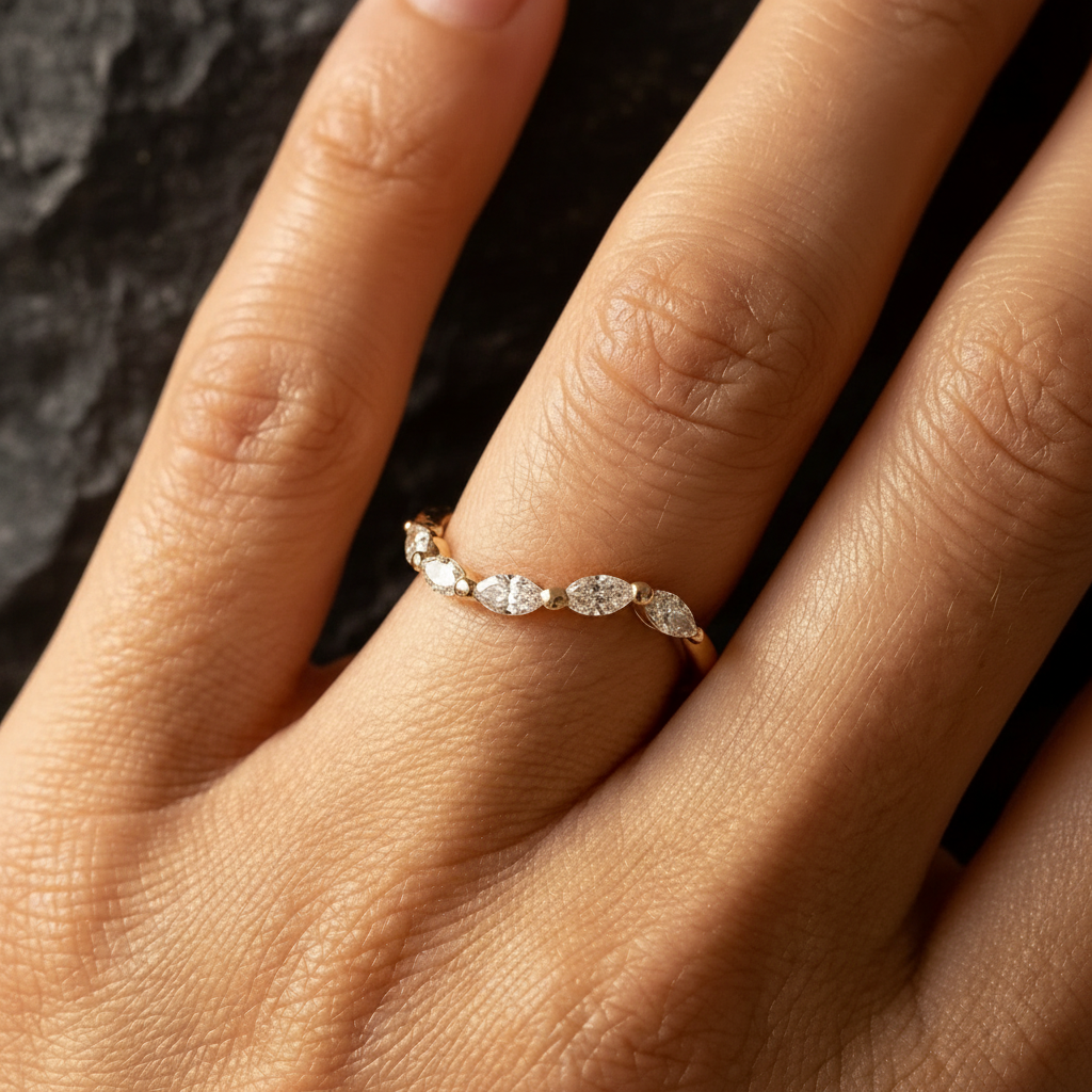 Artisan wedding ring in gold with 5 marquise diamonds